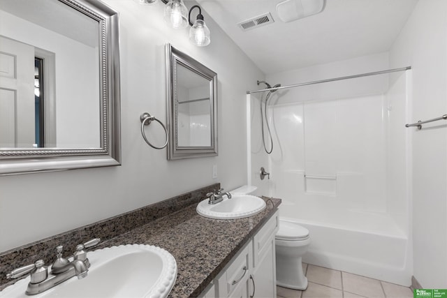 full bathroom featuring tile patterned flooring, vanity, toilet, and shower / bathing tub combination