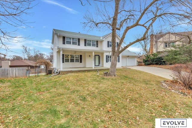 view of front facade featuring a front yard, a porch, and a garage