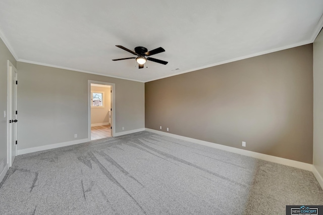 unfurnished bedroom featuring carpet flooring, ceiling fan, ornamental molding, and ensuite bathroom