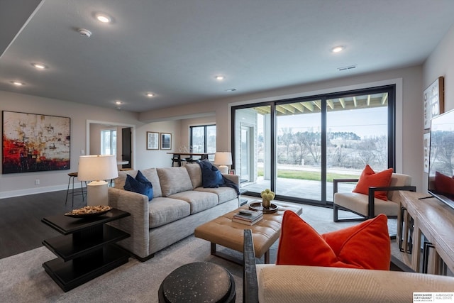 living room with light hardwood / wood-style floors