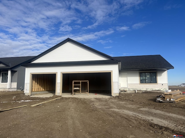 view of property exterior featuring a garage