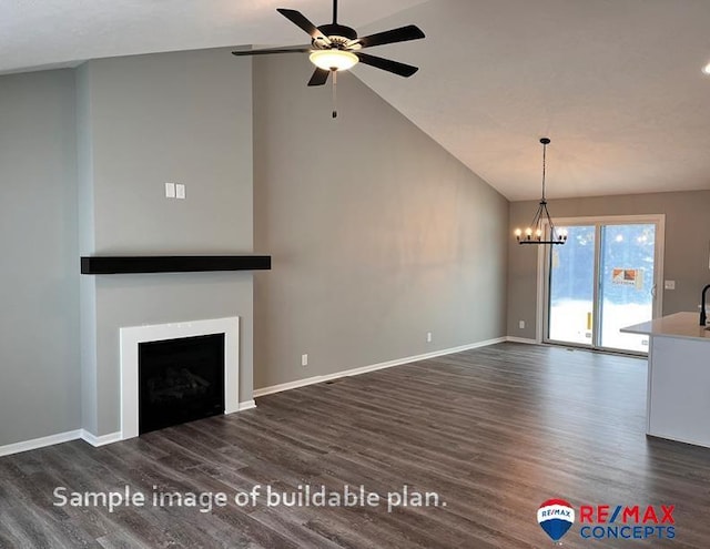 unfurnished living room with ceiling fan with notable chandelier, dark wood-type flooring, and lofted ceiling