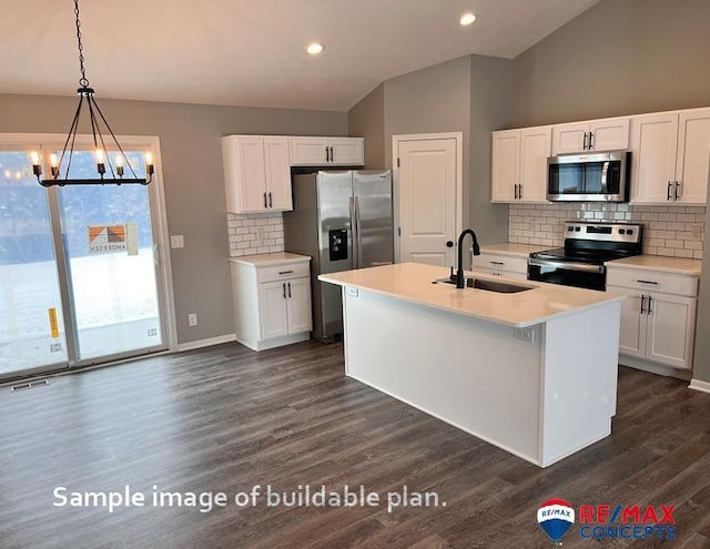 kitchen featuring appliances with stainless steel finishes, white cabinetry, and a chandelier