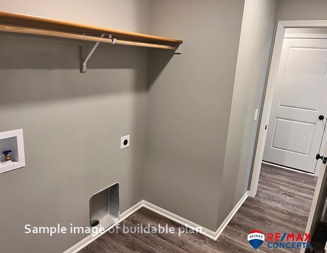 laundry room featuring dark wood-type flooring, hookup for a washing machine, and hookup for an electric dryer