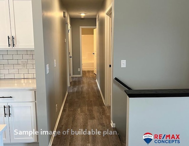 corridor featuring dark hardwood / wood-style floors