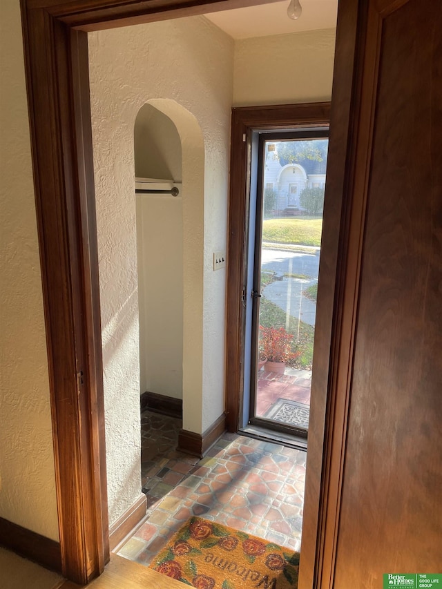 view of tiled foyer entrance