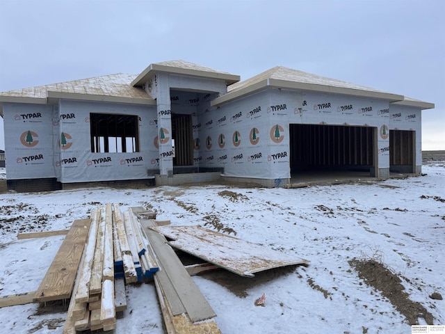 property under construction with a garage