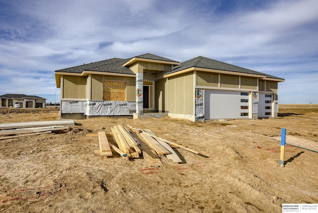 property under construction featuring a garage