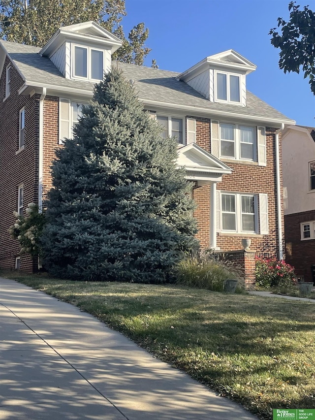 view of front of house with a front yard