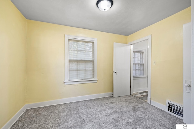 empty room featuring carpet