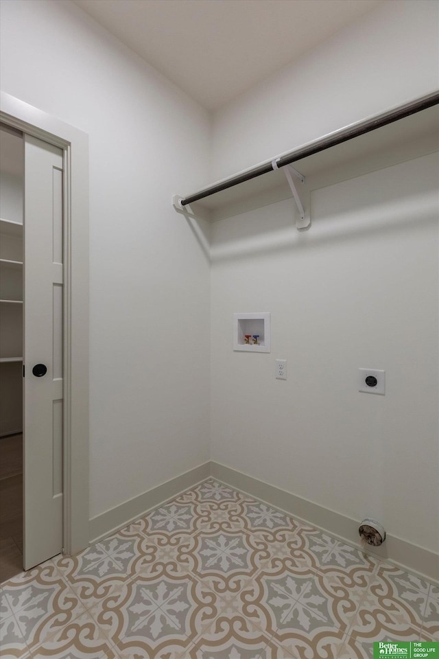 laundry room featuring tile patterned flooring, hookup for a washing machine, laundry area, baseboards, and electric dryer hookup