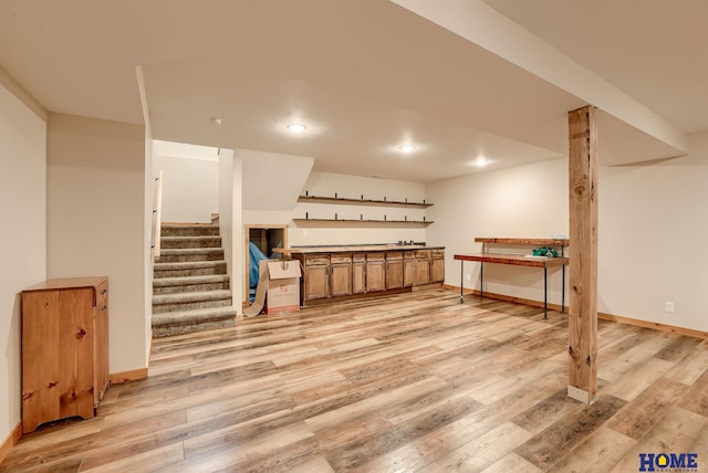 basement with light wood-type flooring