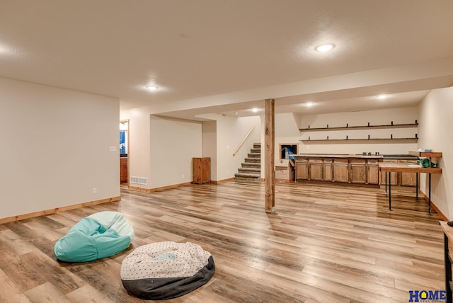 basement with light wood-type flooring