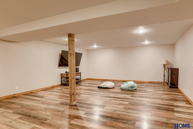 exercise area with hardwood / wood-style floors