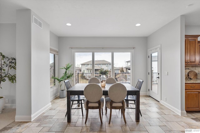 dining area featuring a healthy amount of sunlight