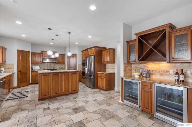 kitchen with a center island, stainless steel fridge with ice dispenser, pendant lighting, and wine cooler