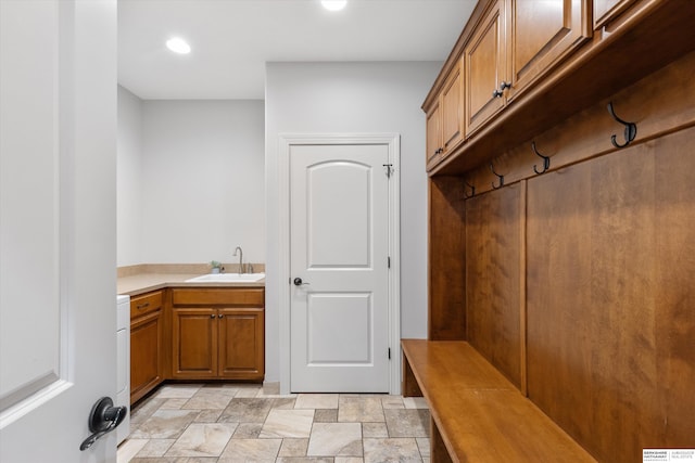 mudroom featuring sink