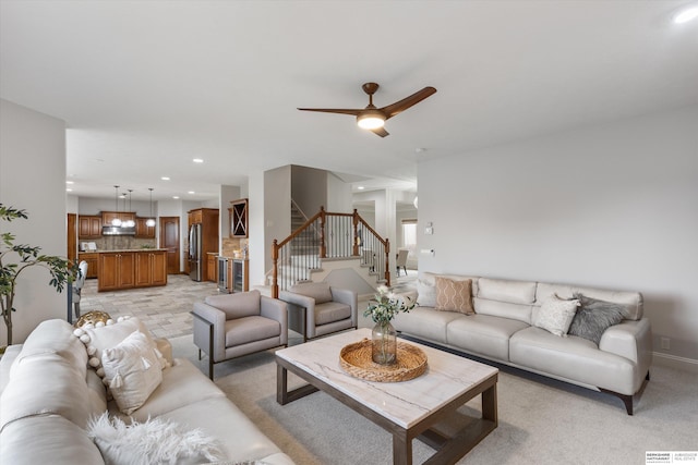 living room featuring ceiling fan