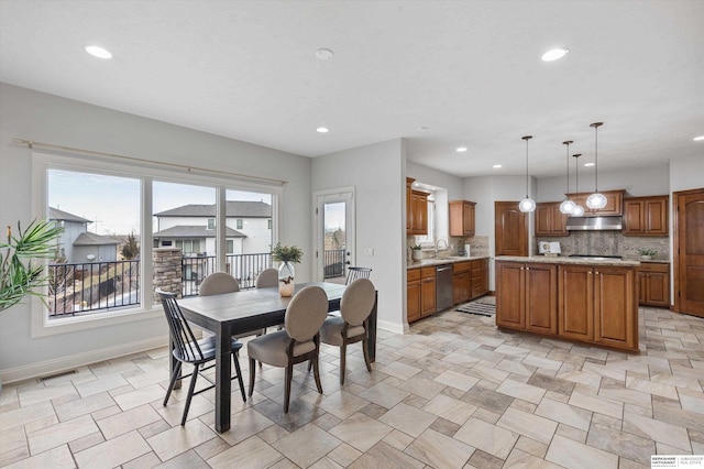 dining space with sink