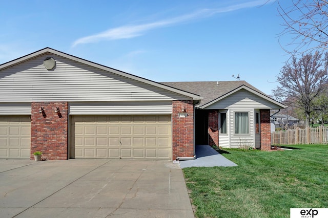 single story home with a garage and a front yard