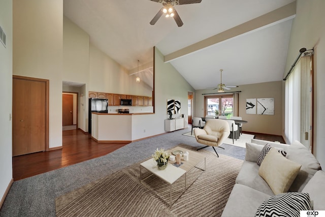 carpeted living room featuring ceiling fan, beamed ceiling, and high vaulted ceiling