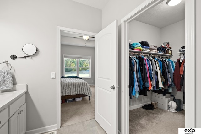 bathroom with vanity and a textured ceiling