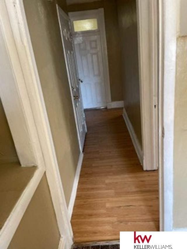 hallway featuring light hardwood / wood-style flooring