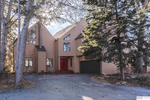 view of front of property with a garage