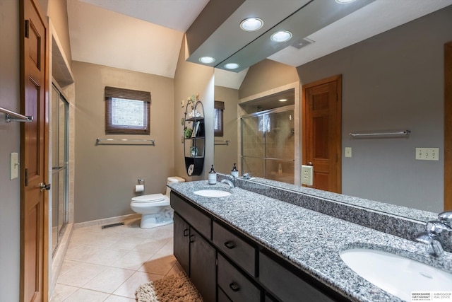 bathroom with vanity, a shower with shower door, vaulted ceiling, and toilet