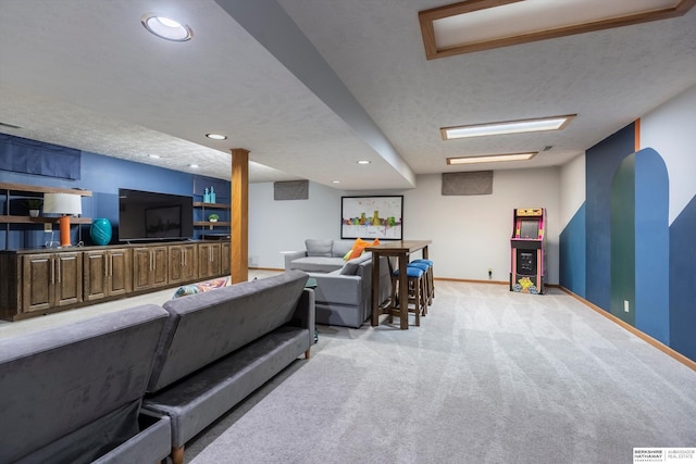 carpeted living room with a textured ceiling