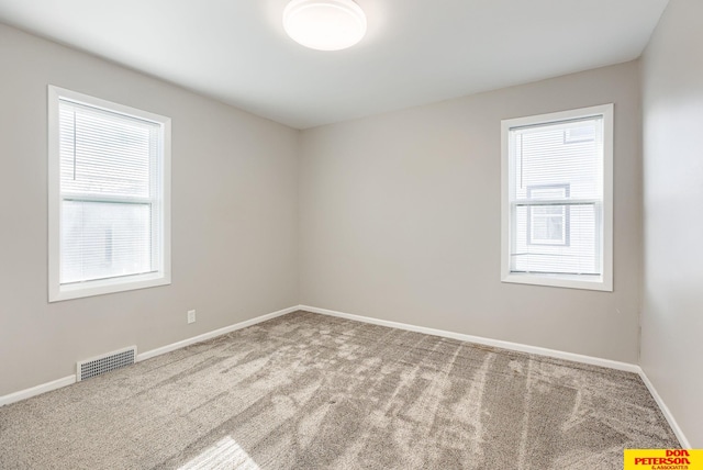 view of carpeted spare room