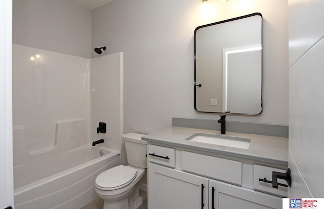 full bathroom featuring shower / tub combination, vanity, and toilet