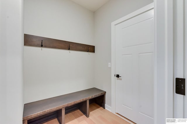 mudroom with light hardwood / wood-style flooring