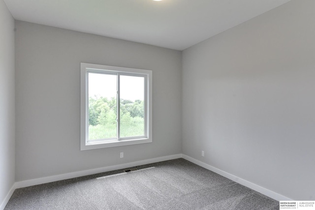 view of carpeted spare room