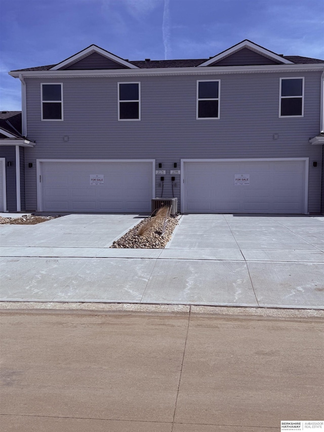 view of front of property with an attached garage and driveway