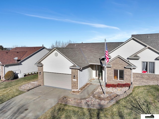 ranch-style home with a garage and a front yard