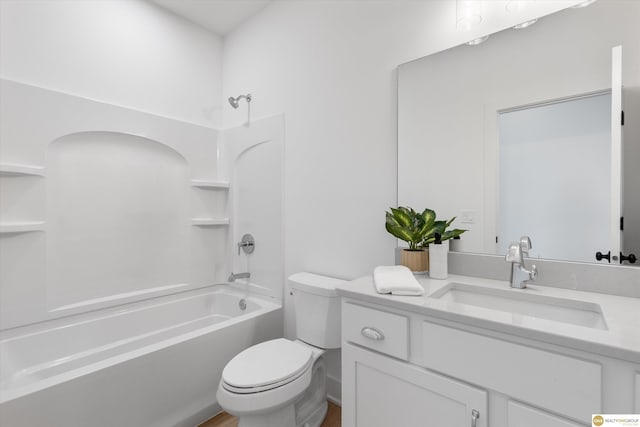 full bathroom featuring vanity, toilet, and shower / bathtub combination