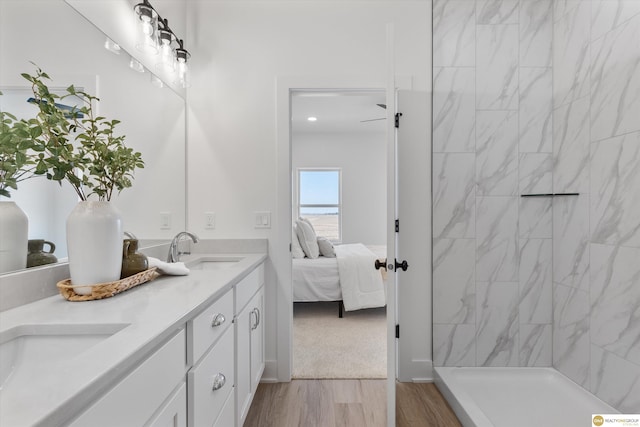 bathroom with vanity and wood-type flooring