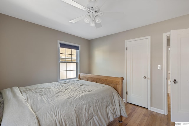 bedroom with ceiling fan and light hardwood / wood-style flooring