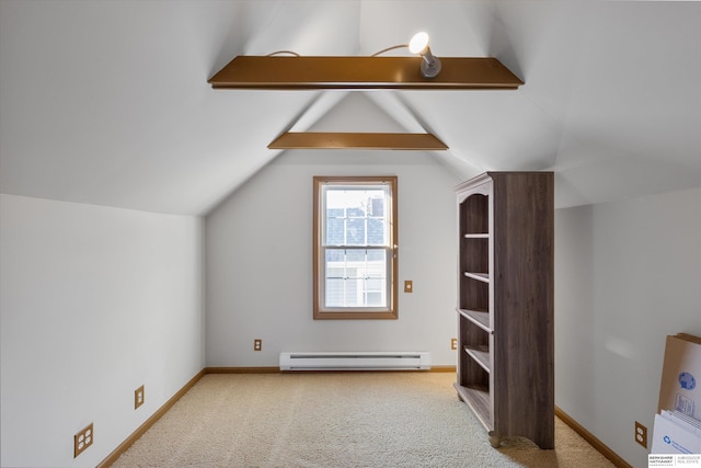 bonus room with baseboard heating, light carpet, and vaulted ceiling with beams