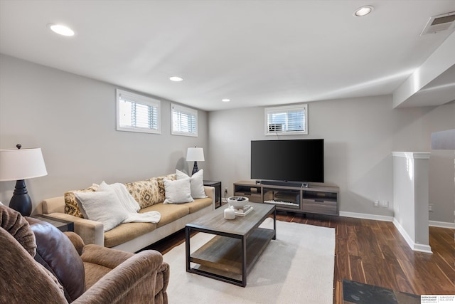 living room with dark wood-type flooring