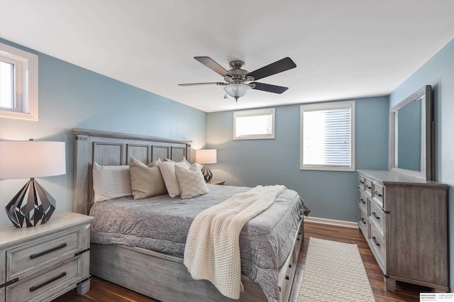 bedroom featuring dark wood-type flooring and ceiling fan