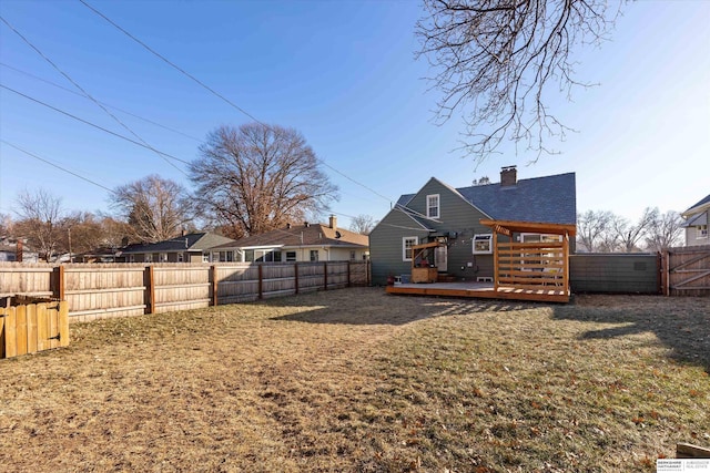 view of yard featuring a wooden deck