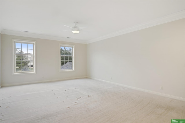 unfurnished room with crown molding and ceiling fan