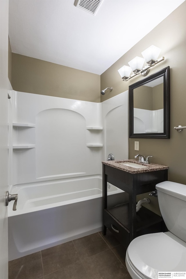 full bathroom featuring toilet, shower / bath combination, tile patterned floors, and vanity