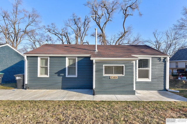 exterior space with a yard and a patio area