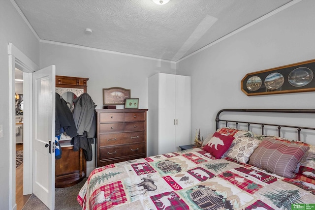 bedroom featuring carpet flooring, a textured ceiling, vaulted ceiling, and crown molding