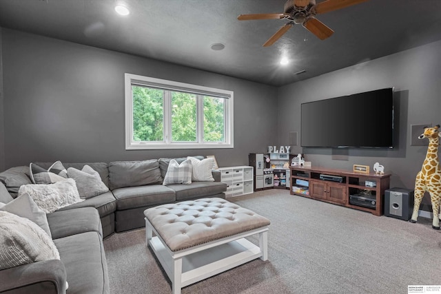 living room with carpet flooring and ceiling fan