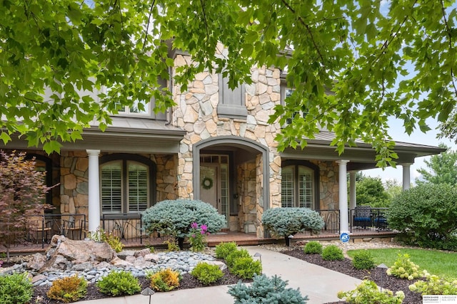 view of front of home featuring covered porch