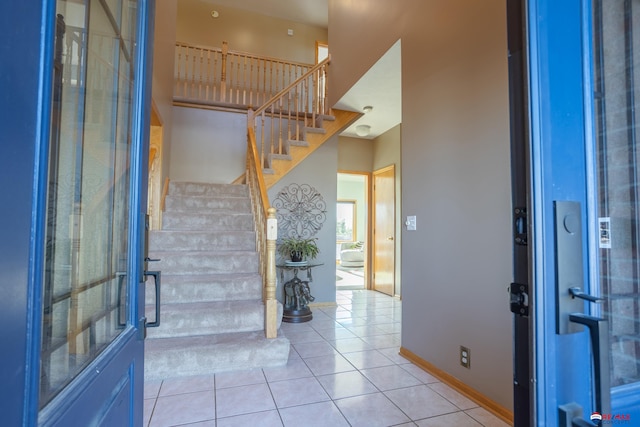 view of tiled foyer entrance